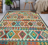 Sangat Ulbolsyn Turquoise/Ivory Rug, 5'9" x 8'1"