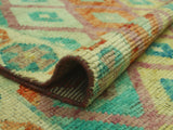 Balochi Akwtee Turquoise/Ivory Rug, 8'2" x 11'5"