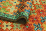 Balochi Zabrina Orange/Green Rug, 5'6" x 7'11"